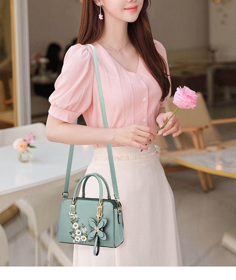 Dam handväska – Blommig broderad svart faux leather