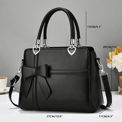 Chic damhandväska med rosett – axelrem & handledsväska