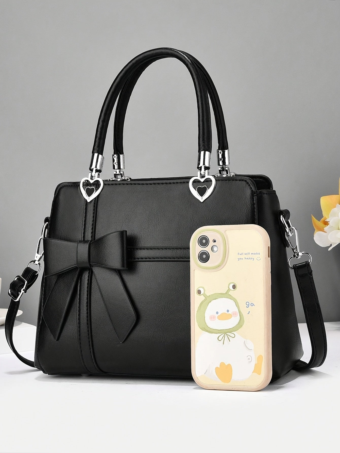 Chic damhandväska med rosett – axelrem & handledsväska