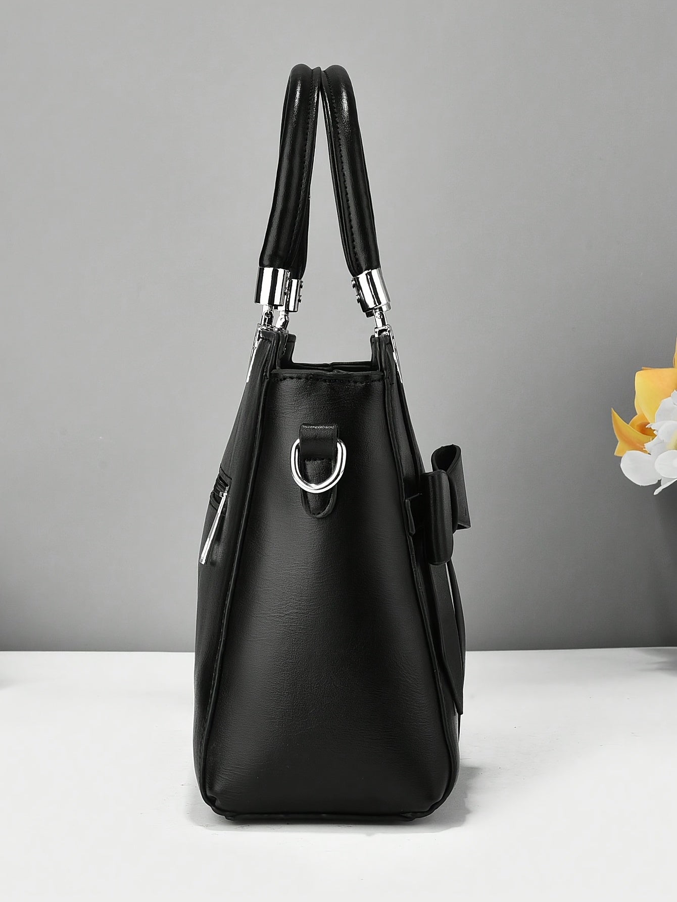 Chic damhandväska med rosett – axelrem & handledsväska