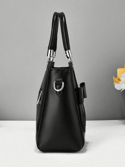 Chic damhandväska med rosett – axelrem & handledsväska