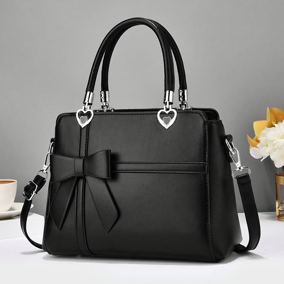 Chic damhandväska med rosett – axelrem & handledsväska