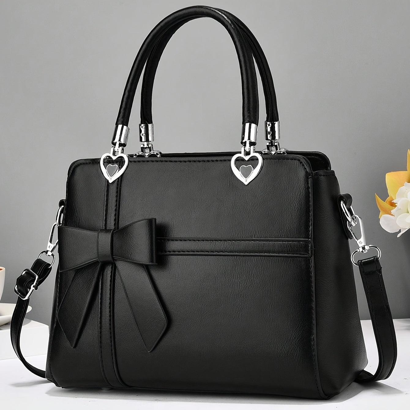 Chic damhandväska med rosett – axelrem & handledsväska