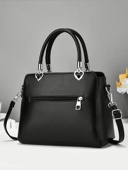 Chic damhandväska med rosett – axelrem & handledsväska