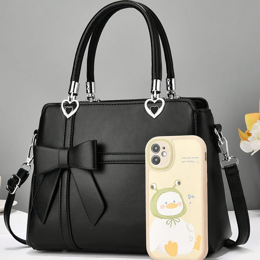 Chic damhandväska med rosett – axelrem & handledsväska