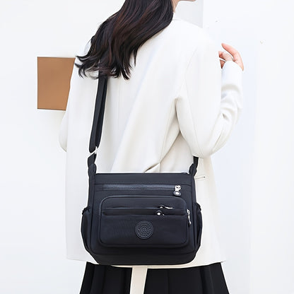 Dam crossbody-väska – Svart nylon med justerbar rem