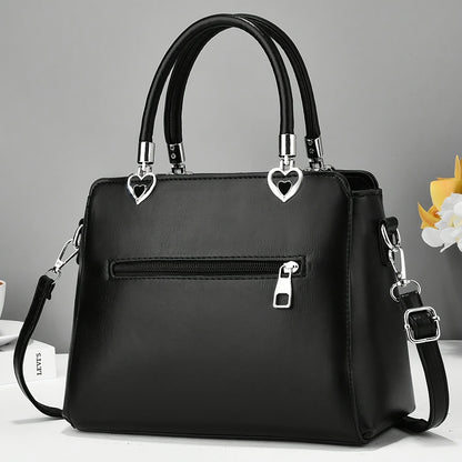 Chic damhandväska med rosett – axelrem & handledsväska