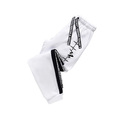 Huvtröja och joggingbyxor