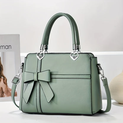 Chic damhandväska med rosett – axelrem & handledsväska