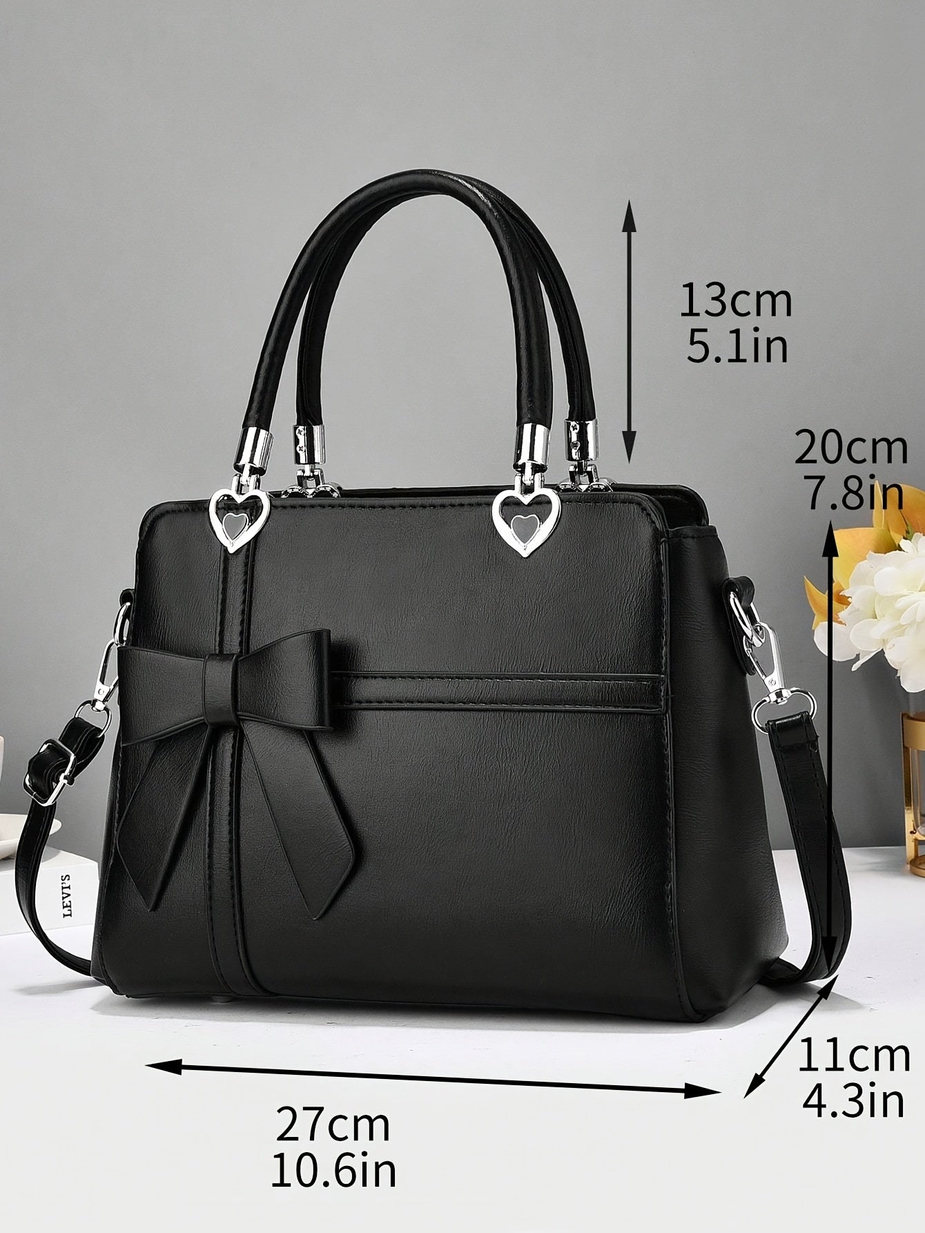 Chic damhandväska med rosett – axelrem & handledsväska